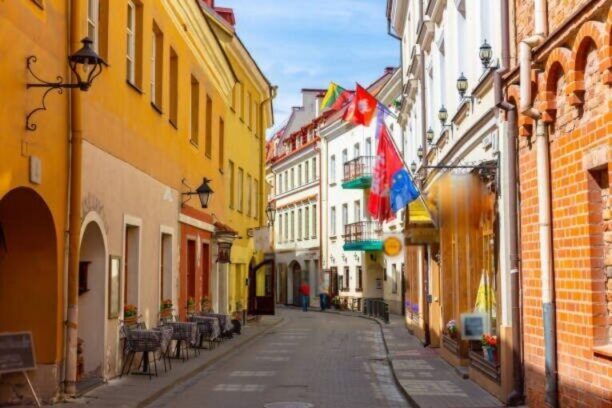 This pic shows beautiful and colorful streets in Old Town of Vilnius, Lithuania. The street has Gothic style architecture and colorful buildings.The pic is taken in daytime in june 2019.
